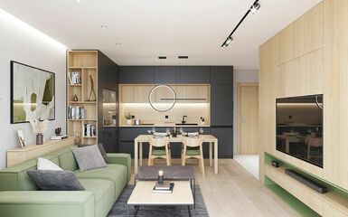 Lakberendezés világos fa színekkel, zöld kanapéval és modern konyhabútorral 43 m2-en