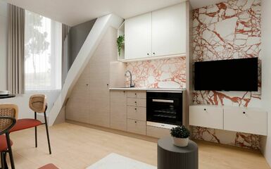 Trendi színekkel és modern bútorokkal berendezett 25 m2-es galériás minigarzon a Szondi utcában